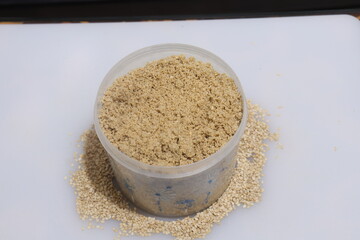 Organic natural Til Gul OR Sesame seeds over white background