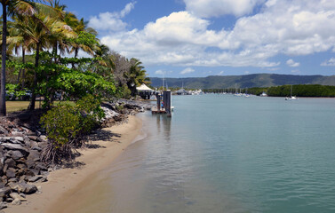 boat jetty beach and marina port douglas