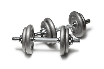 Fototapeta na wymiar Metal dumbbells for fitness with chrome silver handle isolated on white