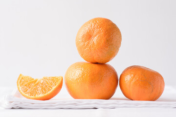 Fresh orange fruit on white background	