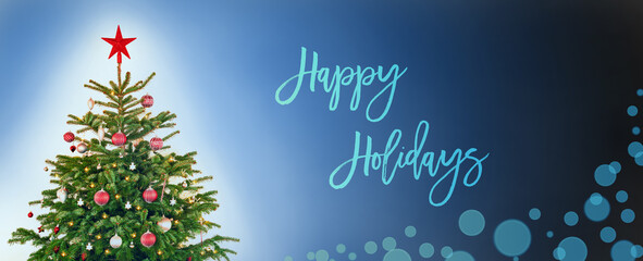English Text Happy Holidays. Christmas Tree With Christmas Ball Decoration And Ornamen Like Star. Blue Background WIth Bokeh Effect.