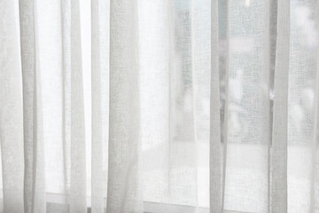 A White curtain textural background on window.