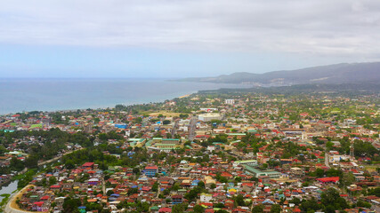 Fototapeta na wymiar Aerial view of Iligan is a city located on the island of Mindanao, Philippines. Iligan City, Lanao del Norte.