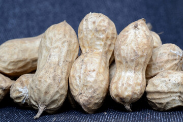 Groundnuts of the new harvest in autumn closeup. Shallow depth of field