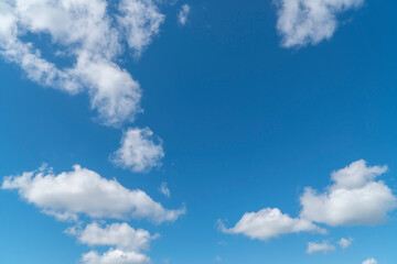 blue sky background with white soft clouds with copy space