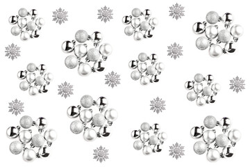 christmas pattern made of snowflakes and silver ball on white background. winter concept, flat lay, top view