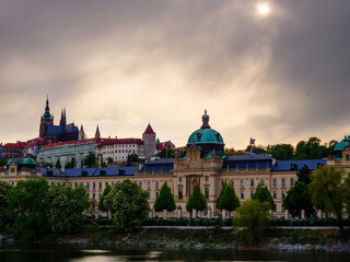 Naklejka premium Dramatic sunset sky over Prague Castle