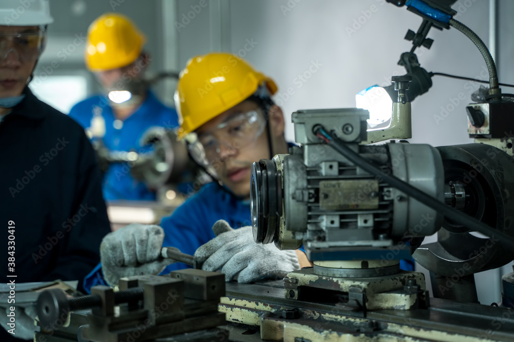 Poster Engineer and factory worker are working on projects at machine for steel structure industry.