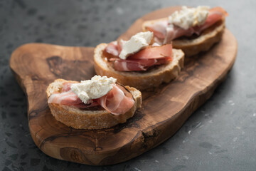 Bruschetta with panchetta, ricotta and fig jam
