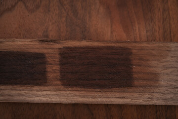 toning oil sample on walnut wood