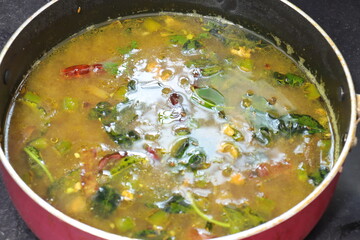 South Indian Rasam,Tamarind juice cooked with spices and tomato