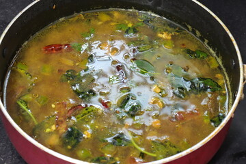 South Indian Rasam,Tamarind juice cooked with spices and tomato