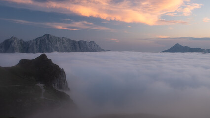 mountain sunset with expanse of clouds