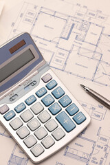設計図と電卓とペン