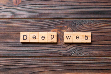 Deep web word written on wood block. Deep web text on cement table for your desing, concept