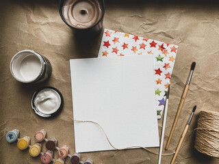 White canvas, acrylic paint and candle