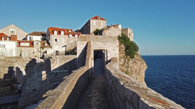 Walk on the ancient, defensive city wall in Dubrovnik, Croatia at the Dalmatian Coast of the Adriatic Sea.