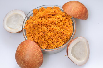 Close up view of dried coconut chips chutney on white background in india