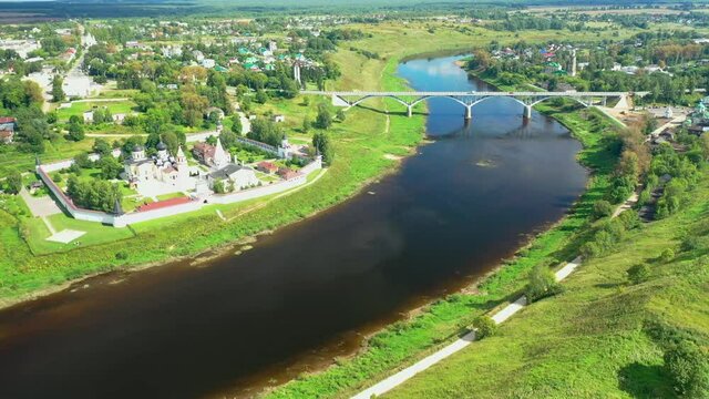 Aerial view of the Staritsa town and the road bridge over the Volga rivers