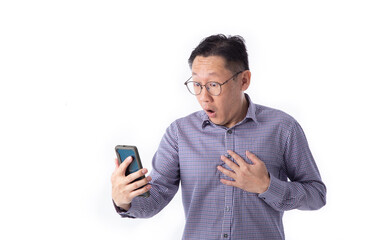 Surprised face of Asian man shocked what he see in the smartphone