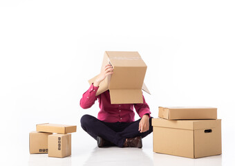 Fototapeta premium man cover his head with cardboard and confused on courier parcels.