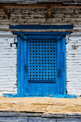 Blue window Dhampus Mountain village, Nepal
