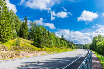 The main road in Ruskeala, a small town of republic significance of Sortavala in the Republic of Karelia, Russia. An international tourist route, Blue Highway. 
