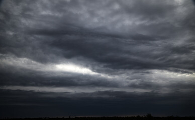 Fototapeta na wymiar beautiful dark dramatic sky with stormy clouds