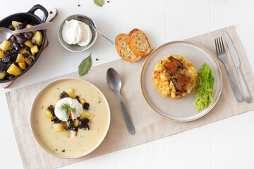 Fresh roasted boletus with mashed potatoes and kale. Thick creamy soup with fresh forest mushrooms. Favorite season mushroom lunch or dinner in Czech Republic.