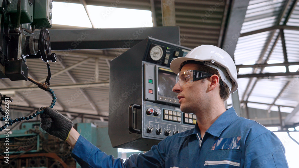 Poster smart factory worker using machine in factory workshop . industry and engineering concept.