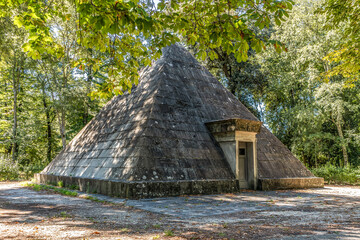 An old pyramid-shape ice house, building used to store ice throughout the year, in the monumental...