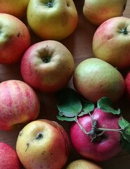 red apples on a wooden table