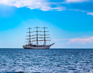 Plakat Sailing ship in the sea without sails. Selective focus