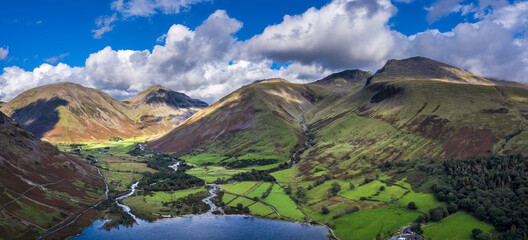 Beautiful drone view over Lake District landscape in late Summer, in Wast Water valley with mountain views and dramatic sky