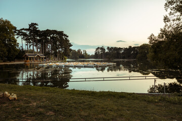 Fototapeta premium Inferior lake and barks in Bois de Boulogne, near Paris
