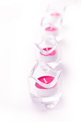 Red tealight candle isolated in white, clean background