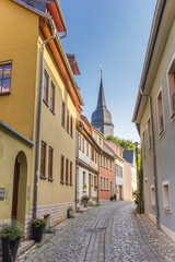 Fototapeta na wymiar Historic street leading to the Jakobskirche church in Weimar, Germany
