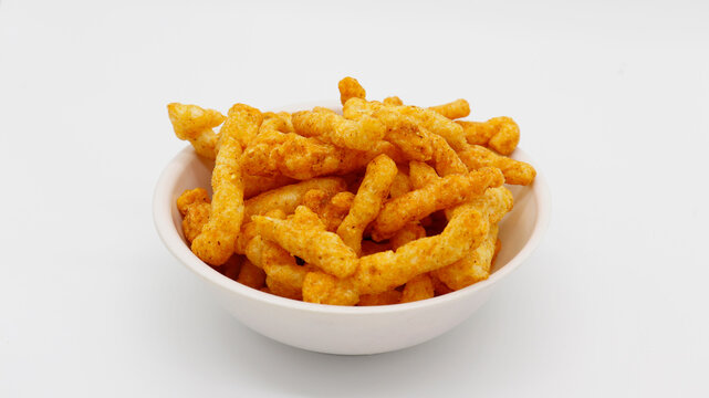 Healthy crunchy snack,Kurkure snack,Evening Snack or the Tea Snack,Kurkure is an evening snack that is manufactured using edible ingredients like rice meal, Background Texture