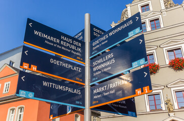 Tourist information sign in front of a historic building in Weimar, Germany - obrazy, fototapety, plakaty