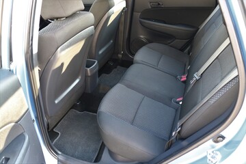 Auto interior with back seats.