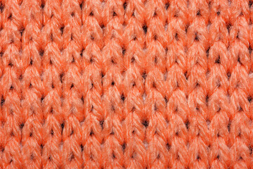 Red synthetic knitted fabric texture
