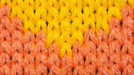 Yellow and red synthetic knitted fabric texture