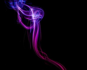 Obraz premium Colored smoke on black background