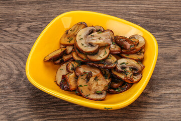 Roasted champignon with herbs and spices