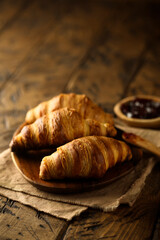 Traditional homemade French croissants on a plate