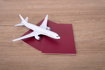 A small airplane model on two passports