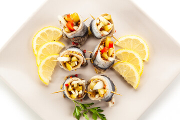 Marinated herring fillets on white background
