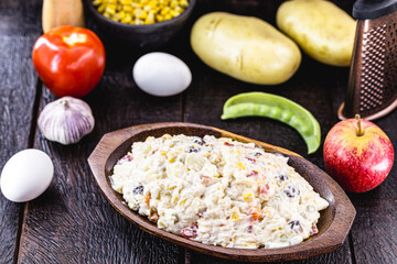 mayonnaise with vegetables, Brazilian tradition. Mayonnaise with corn, lentils, tomatoes, eggs and raisins.