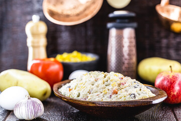 mayonnaise with vegetables, Brazilian tradition. Mayonnaise with corn, lentils, tomatoes, eggs and raisins.
