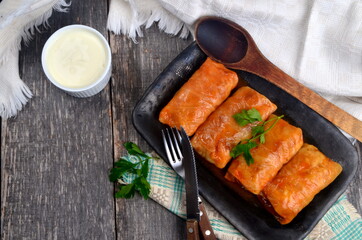 Cabbage rolls stuffed with ground meat and rice. Delicious homemade stuffed cabbage leaves with meat, rice and spices